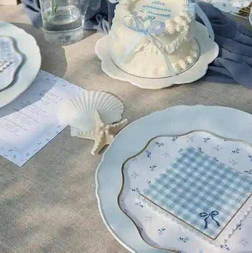 Coastal Pretty cocktail napkins in blue gingham and floral with scalloped gold foil trim