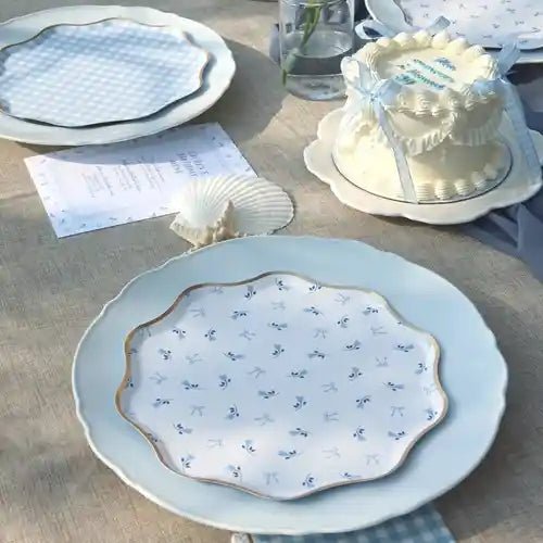 Blue gingham and floral paper plates with gold foil rims