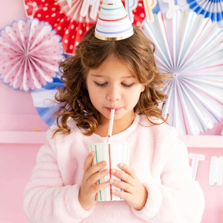Birthday party cups with vibrant stripes for kids or adults